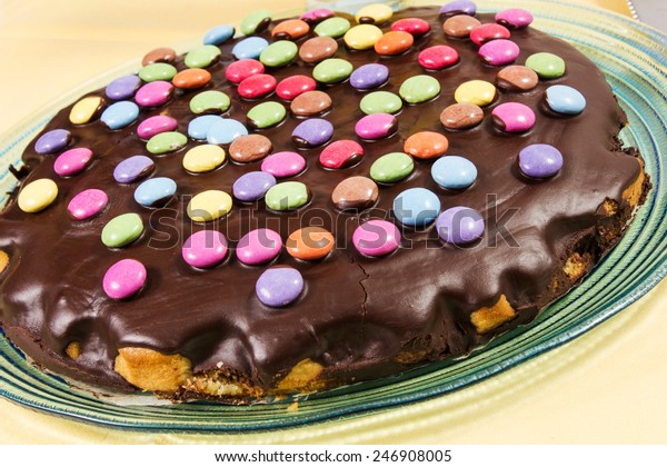 Chocolate Cake Smarties On Yallow Tablecloth Stock Photo Edit Now