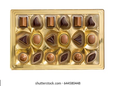 Chocolate Candies In Box Isolated On White. Top View.