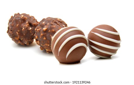 Chocolate candies collection. Beautiful Belgian truffles isolated on white background - Powered by Shutterstock