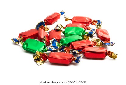 chocolate candies in foil isolated on white background - Shutterstock ID 1551351536