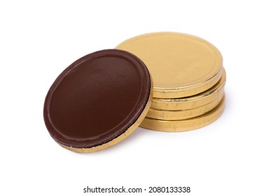 Chocolate candies in the form of coins in golden foil isolated over white background - Powered by Shutterstock