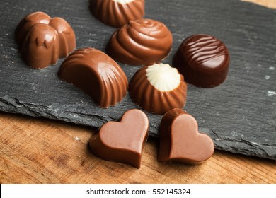 Chocolate Candies On A Black Slab