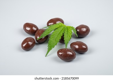 Chocolate Candies With Thc Extract, Sweet Hazelnuts In Chocolate With Marijuana.