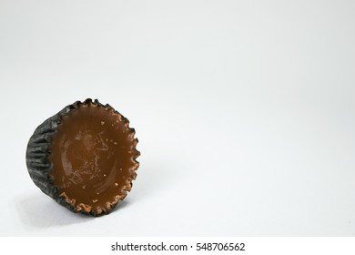 Chocolate Candy Peanutbutter Cup Positioned On A White Background