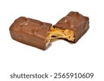 A chocolate candy with thick, gooey caramel, broken down the middle.