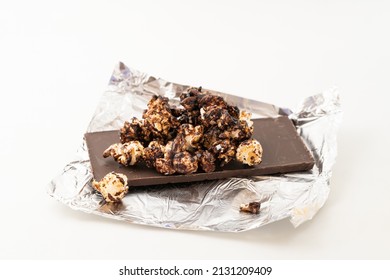 Chocolate Caramel Popcorn On A Solid Background