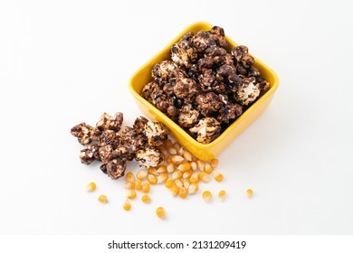 Chocolate Caramel Popcorn On A Solid Background