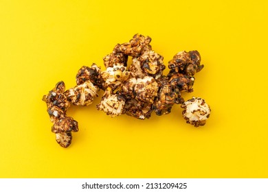 Chocolate Caramel Popcorn On A Solid Background