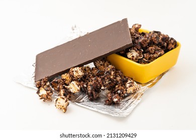 Chocolate Caramel Popcorn On A Solid Background