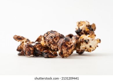 Chocolate Caramel Popcorn On A Solid Background