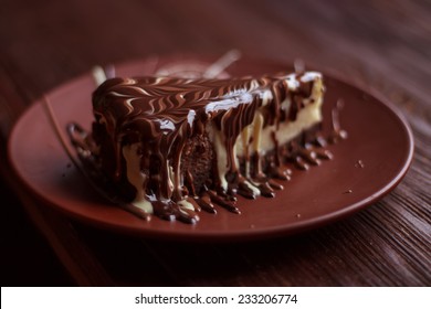 Chocolate cheesecake served on table. Selective focus