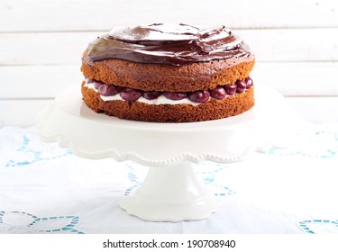 Chocolate Cherry Sandwich Cake On Stand Plate