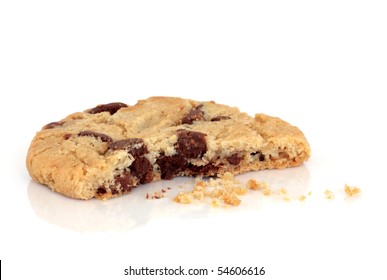 Chocolate Chip Cookie With A Bite Taken Out And Crumbs, Isolated Over White Background.