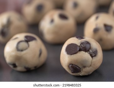 Chocolate Chip Cookie Dough Balls Closeup On Baking Sheet.