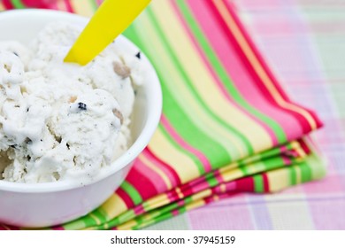 Chocolate Chip Cookie Dough Ice Cream On A Colorful Background. Shallow DOF.