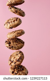 Chocolate Chip Cookies Falling, Pink Background, Food Levitation