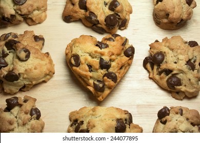 Chocolate chip cookies with heart shape on wood table - Powered by Shutterstock