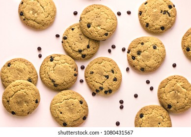 Chocolate Chip Cookies On Pink Pastel Background, Top View, Copy Space