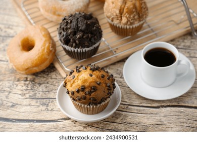 chocolate chip muffin with donut and coffee - Powered by Shutterstock