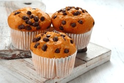 Chocolate Chip Muffins On White Background. 