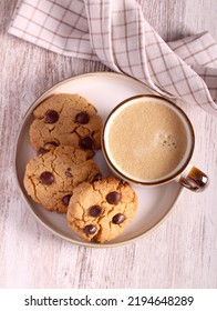 Chocolate Chip Peanut Butter Cookies And Cup Of Coffee