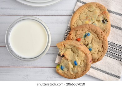 Chocolate Chip Sugar Cookies With A Missing Bite And A Glass Of Milk, Overhead View