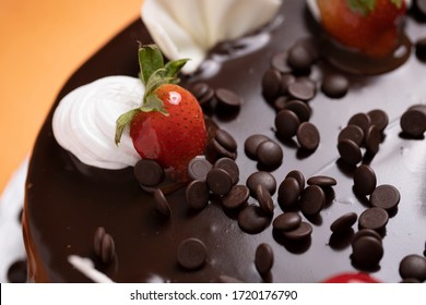 Chocolate Chip Topping With Hot Chocolate Dripping Cake Stock Photo