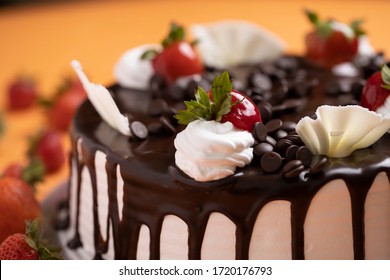 Chocolate Chip Topping With Hot Chocolate Dripping Cake Stock Photo