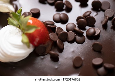 Chocolate Chip Topping With Hot Chocolate Dripping Cake Stock Photo