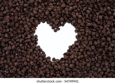 chocolate chips arranged into a heart shape and isolated on white. - Powered by Shutterstock