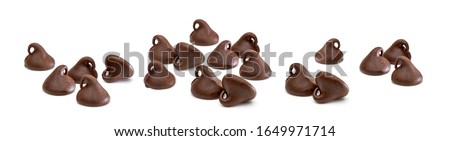 Chocolate chips morsels or drops isolated on white background