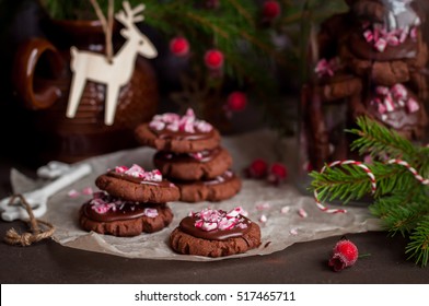 Chocolate Christmas Cookies With Chocolate Glaze And Crushed Candy Cane, Copy Space For Your Text