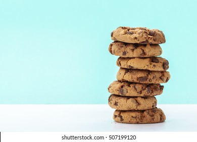 chocolate chunk cookies on a bright blue background 