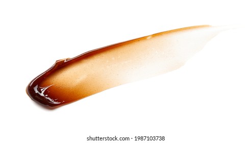 Chocolate Colored Gel Smear And Texture. Cosmetic Gel Or Caramel Syrup On White Background