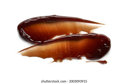 Chocolate Colored Gel Smear And Texture. Cosmetic Gel Or Caramel Syrup On White Background