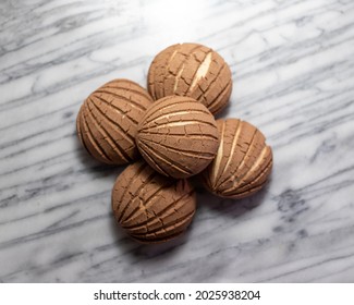 Chocolate Conchas Pan Dulce on White Marble