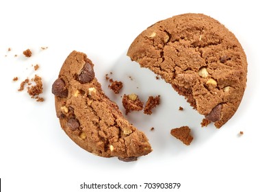Chocolate cookie pieces and crumbs isolated on white background, top view