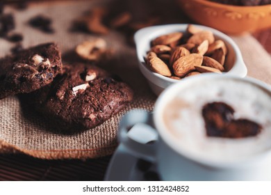 Chocolate cookies with coffee cappuccino and almond - Shutterstock ID 1312424852