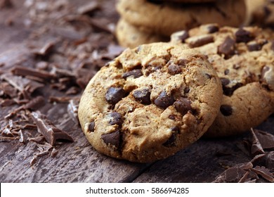 Chocolate cookies on wooden table. Chocolate chip cookies shot - Shutterstock ID 586694285