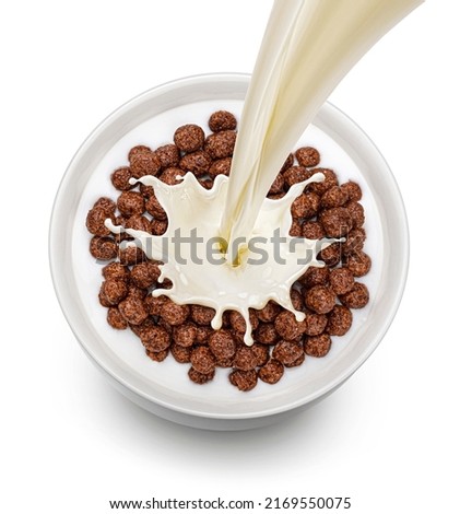 Chocolate corn balls with milk isolated on white background, top view