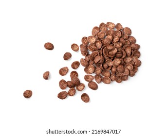 Chocolate corn flakes isolated. Cornflakes pile for breakfast, heap of brown choco cereals, crispy rice flakes, healthy snack group on white background top view