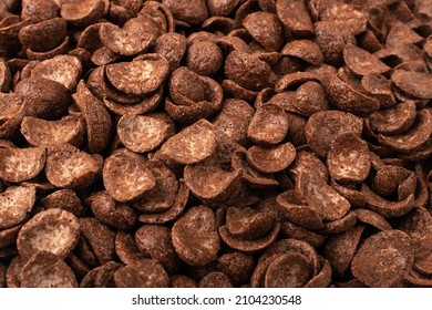 Chocolate Corn Flakes Texture Background. Cornflakes For Breakfast Pattern, Brown Choco Cereals Wallpaper, Crispy Rice Flakes, Healthy Snack Mockup With Copy Space