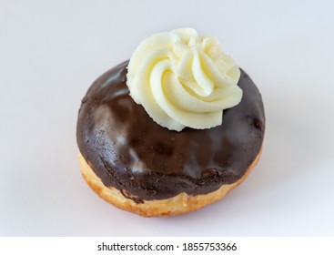 Chocolate Covered  Donut With White Cream  For Hanukkah Celebration.