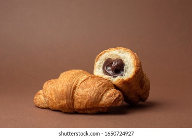 
chocolate croissant on a brown background - Powered by Shutterstock