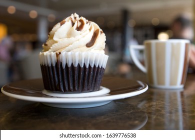 Chocolate Cupcake With A Carmel Swirl Drizzle