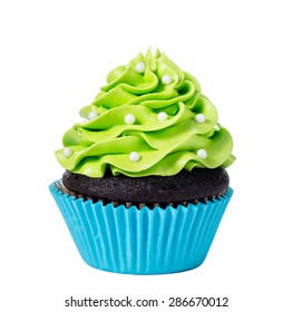 Chocolate Cupcake Decorated With Green Icing And Sprinkles Isolated On White