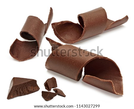 Chocolate curls and parts or broken chocolate morsels isolated on white background with clipping path