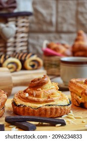 Chocolate Danish Pastry Served On The Wooden Board 