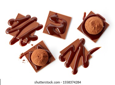 Chocolate Decors And Truffles Isolated On White Background, Top View