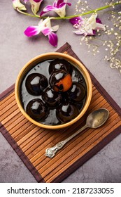 Chocolate dipped gulab jamun, indian creative fusion dessert food - Shutterstock ID 2187233055